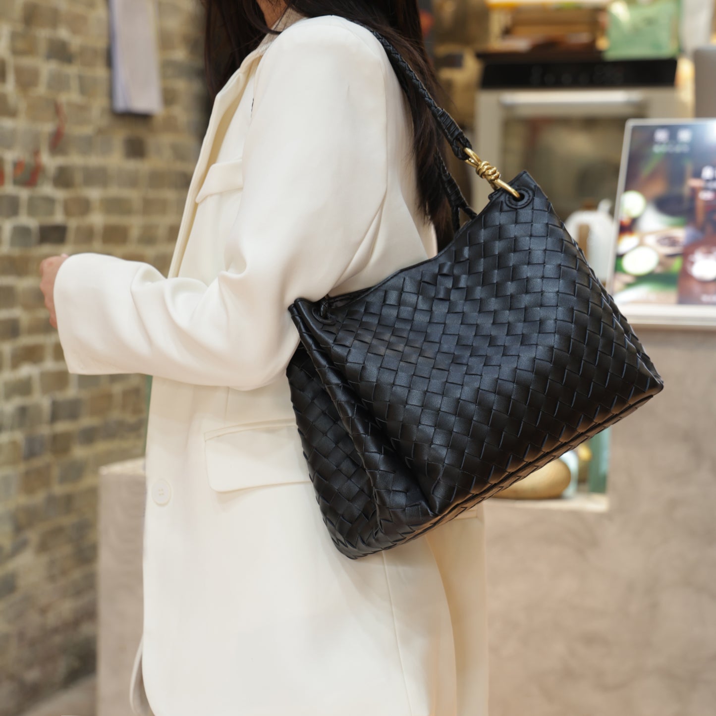 Modern Grace Black Woven Leather Big Parachute Bag | Spacious&Stylish