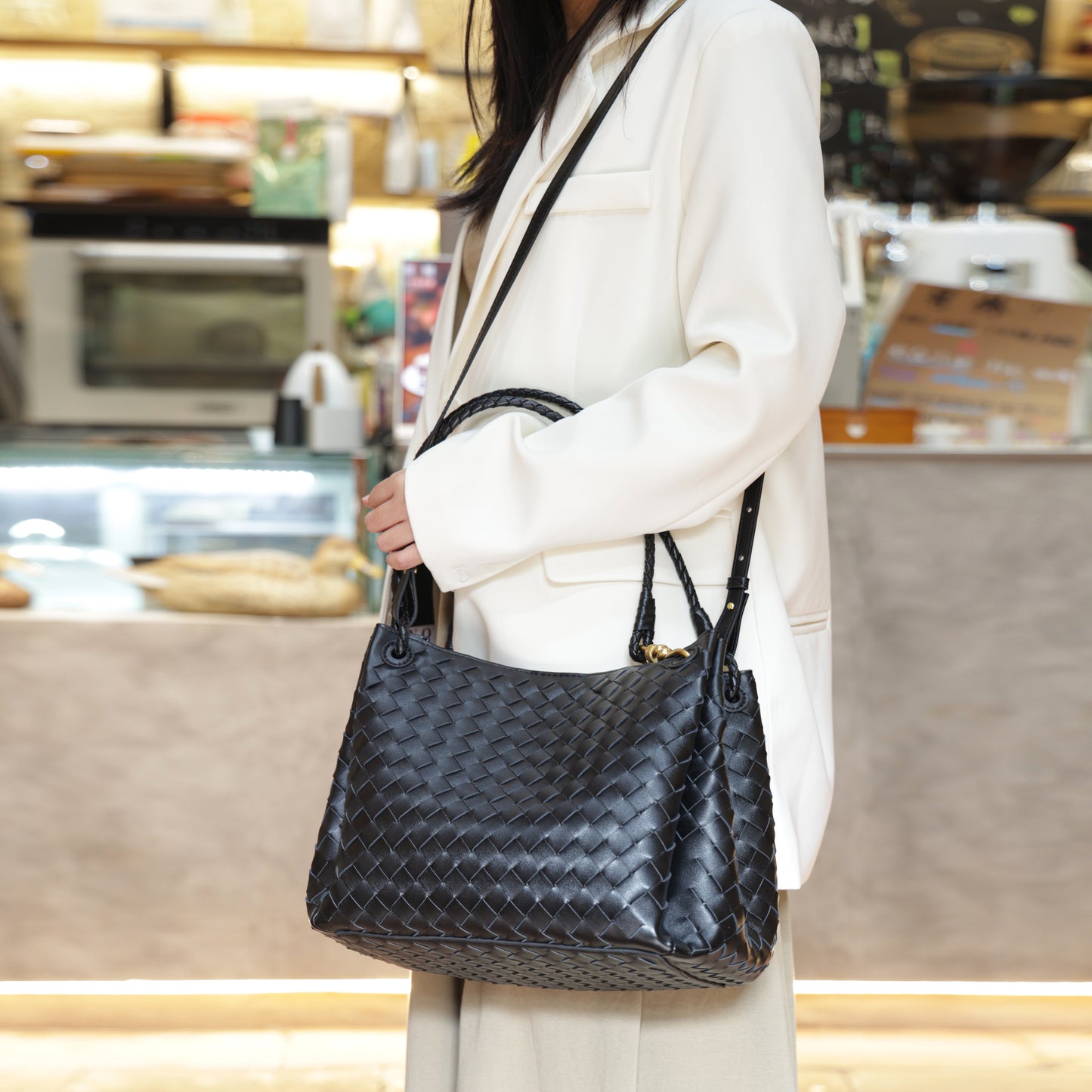 Modern Grace Black Woven Leather Big Parachute Bag | Spacious&Stylish